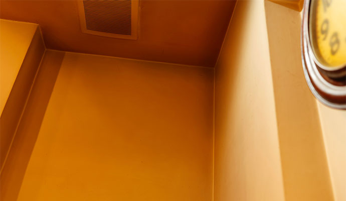 Warm toned room corner vent