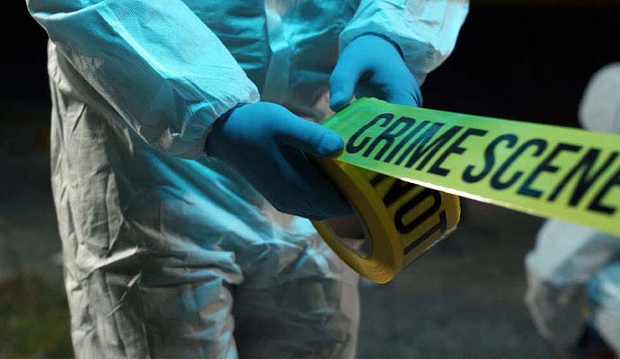 Expert sealing an area for crime scene cleanup