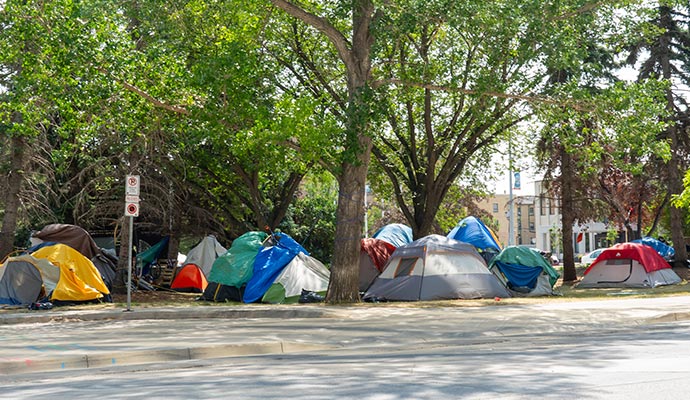 Urban park homeless tents encampment