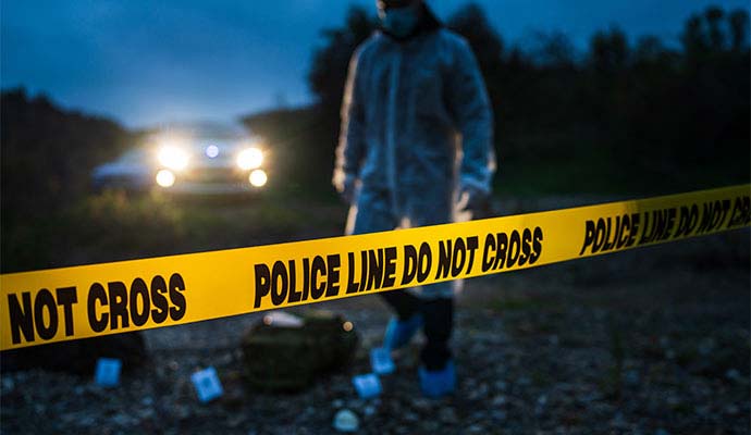 Forensic investigator at crime scene