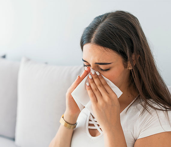 Woman having allergic reaction